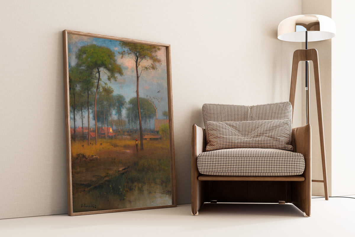 Early Morning, Tarpon Springs by George Inness — framed and leaning against a wall beside an armchair and a floor lamp
