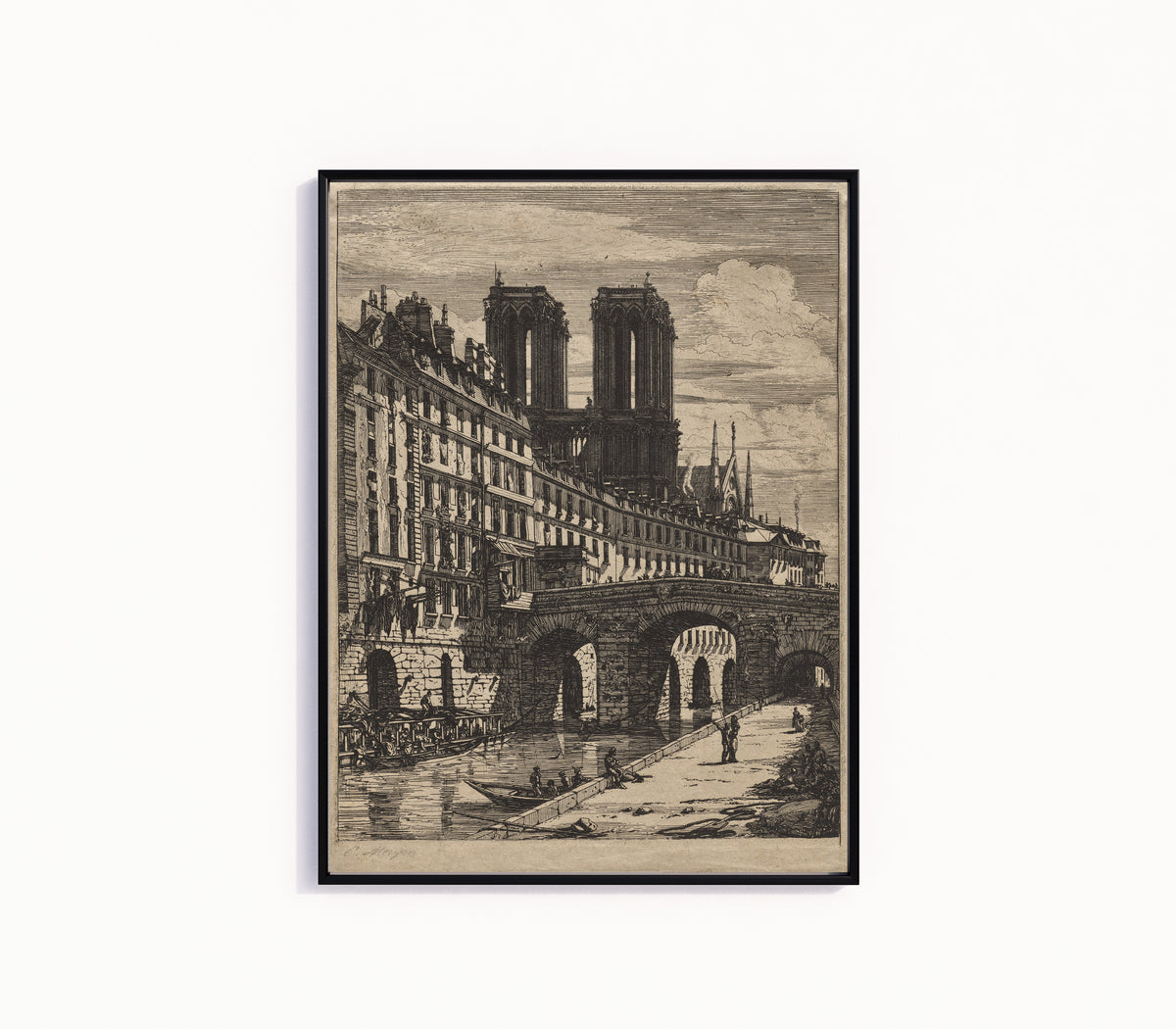 Framed art print of Etchings of Paris: The Little Bridge by Charles Meryon, in a slim black frame on a plain white wall