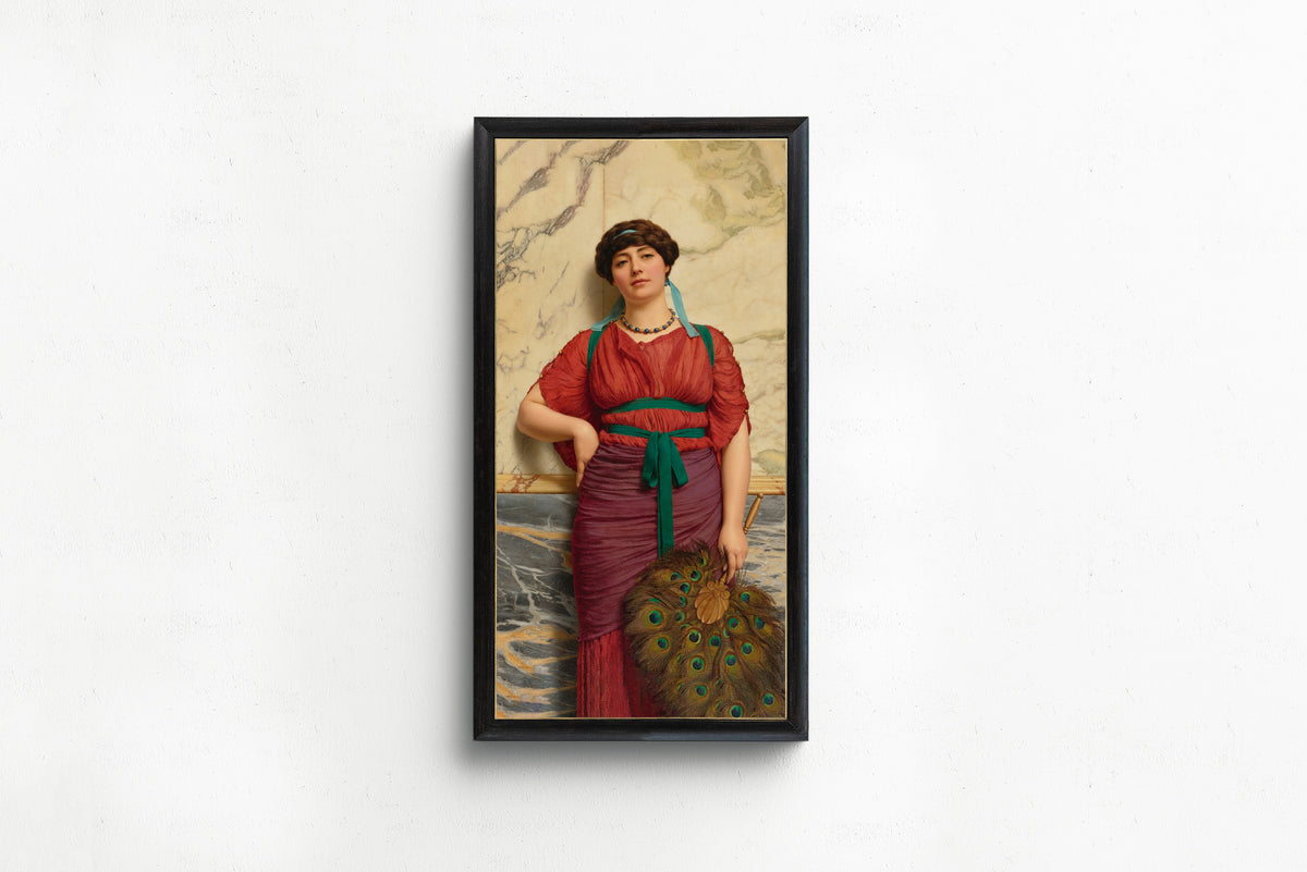 Framed art print of Eurypyle by John William Godward, in a slim black frame on a plain white wall