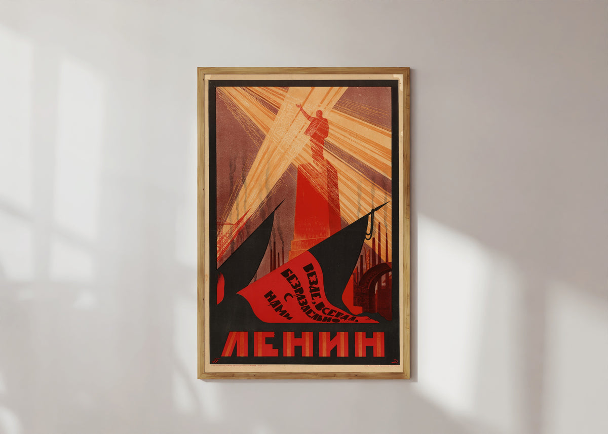 Framed art print of Everywhere, always, inseparably with us is Lenin, in a light wood frame on a sunlit white wall