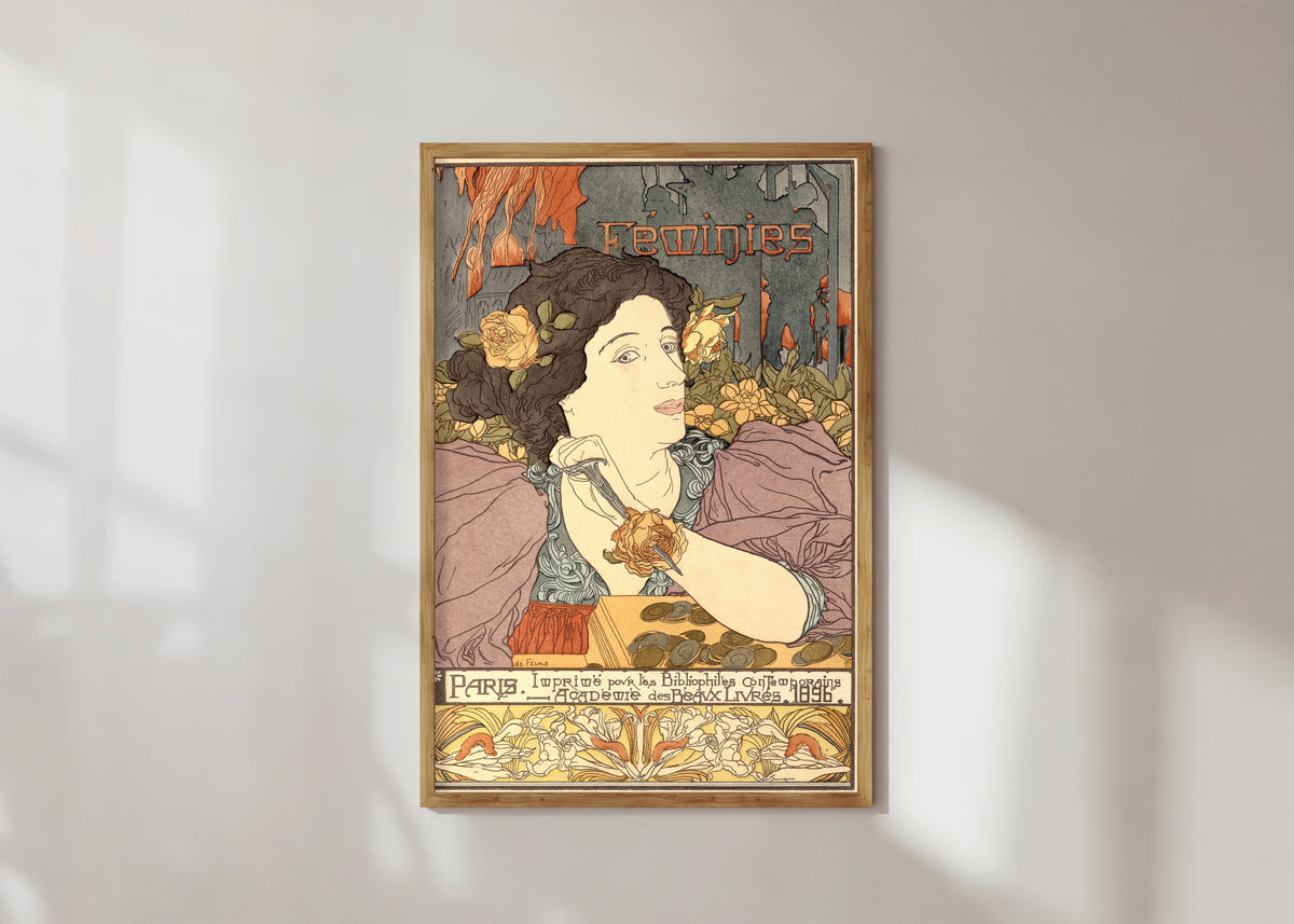 Framed art print of Féminies (frontispiece) by Georges de Feure, in a light wood frame on a sunlit white wall
