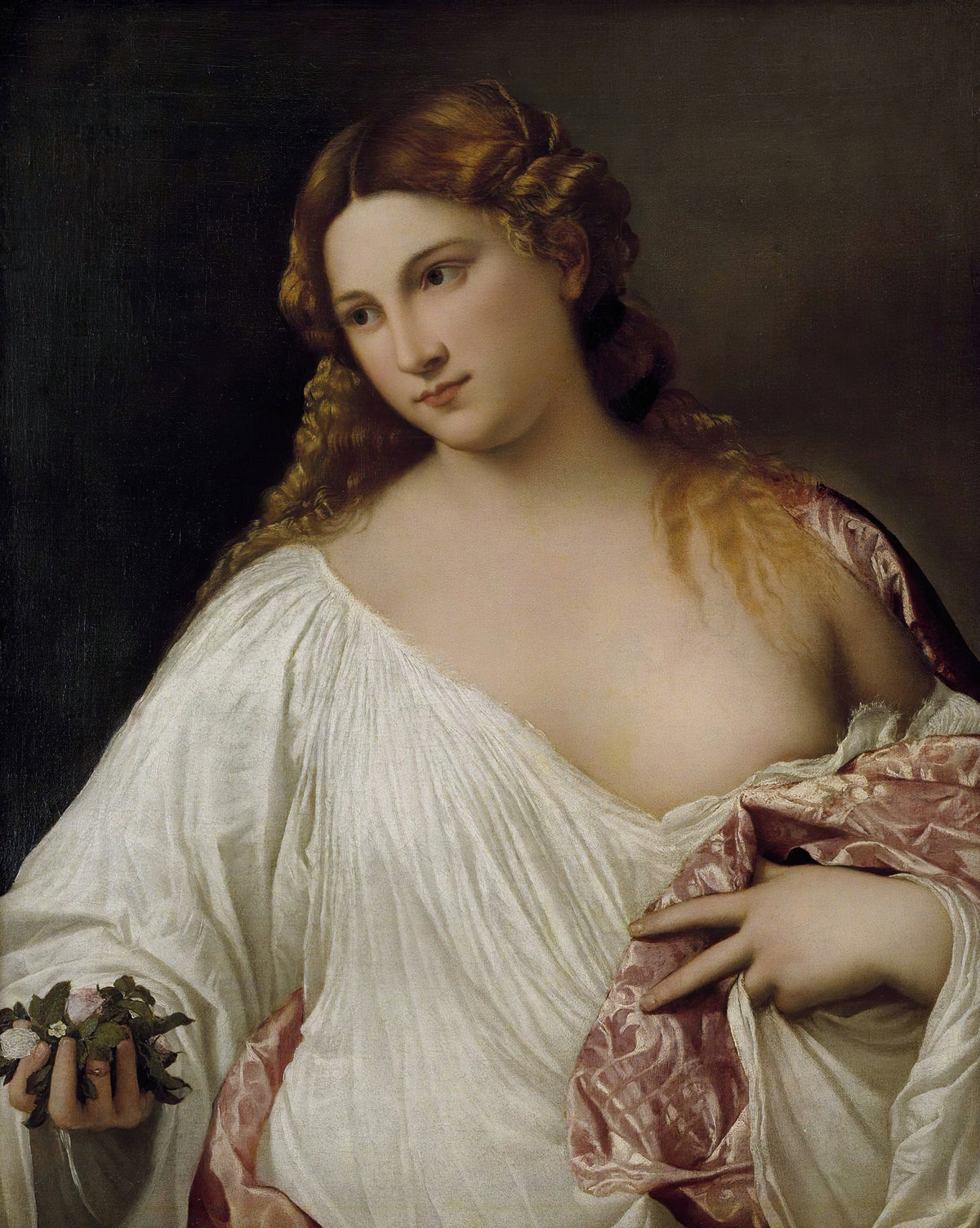 Flora by Titian — A woman in a white chemise holds a small bunch of flowers