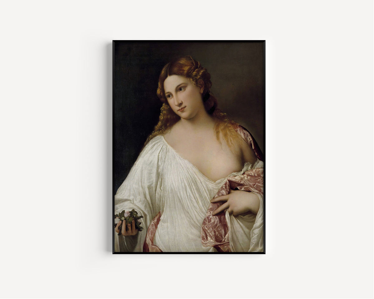 Framed art print of Flora by Titian, in a slim black frame on a plain white wall