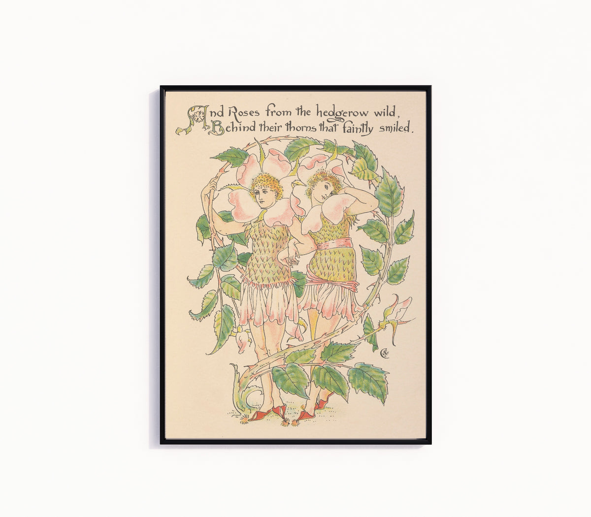 Framed art print of Flora's Feast: Wild Roses by Walter Crane, in a slim black frame on a plain white wall