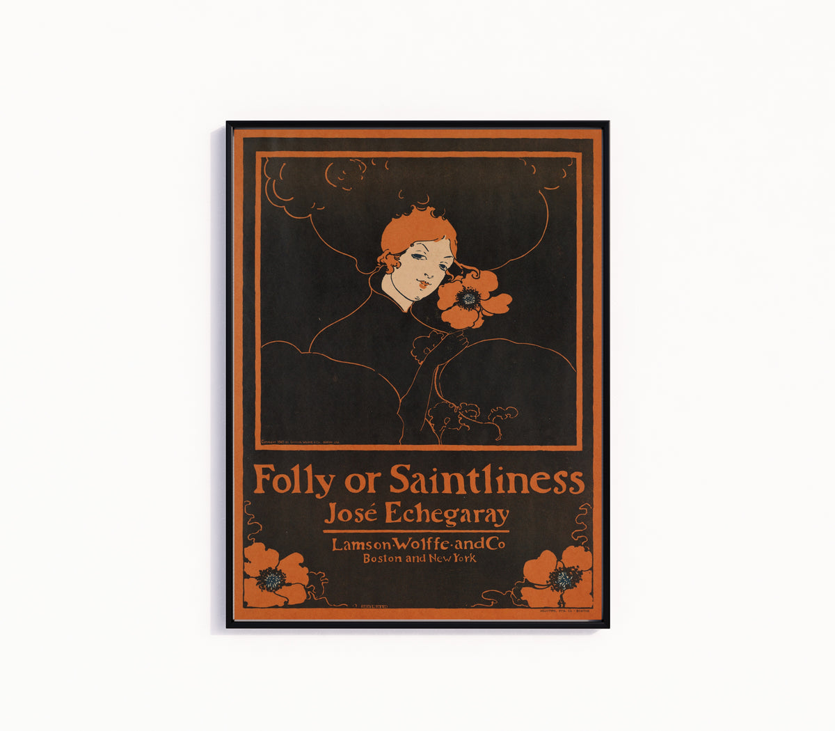 Framed art print of Folly or Saintliness by José Echegaray by Ethel Reed, in a slim black frame on a plain white wall