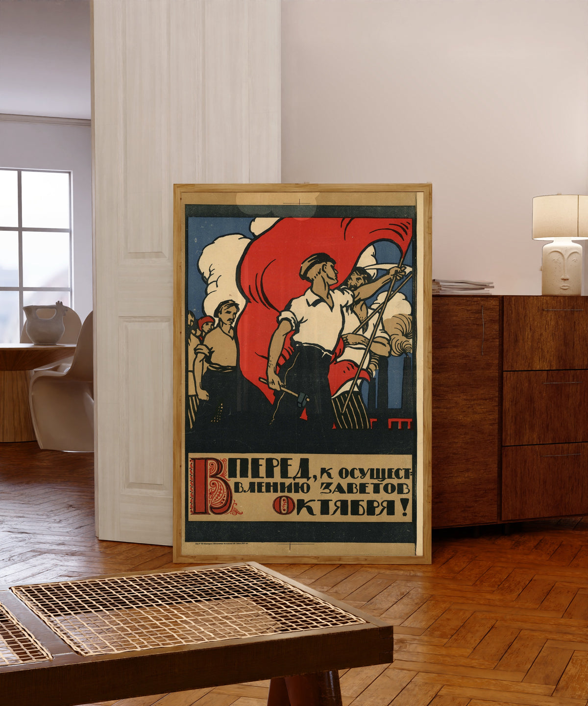 Framed art print of Forward, to the fulfilment of the testaments of October!, in a light wood frame leaning in a warm room with a parquet floor