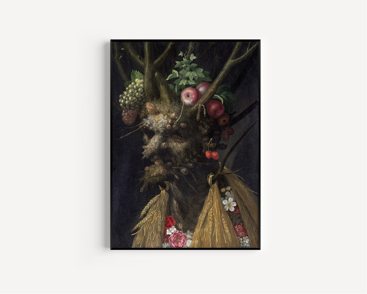Framed art print of Four Seasons in One Head by Giuseppe Arcimboldo, in a slim black frame on a plain white wall