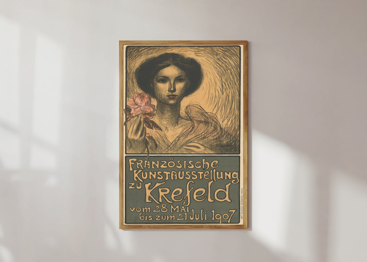 Framed art print of Französische Kunstausstellung zu Krefeld by Théophile Steinlen, in a light wood frame on a sunlit white wall
