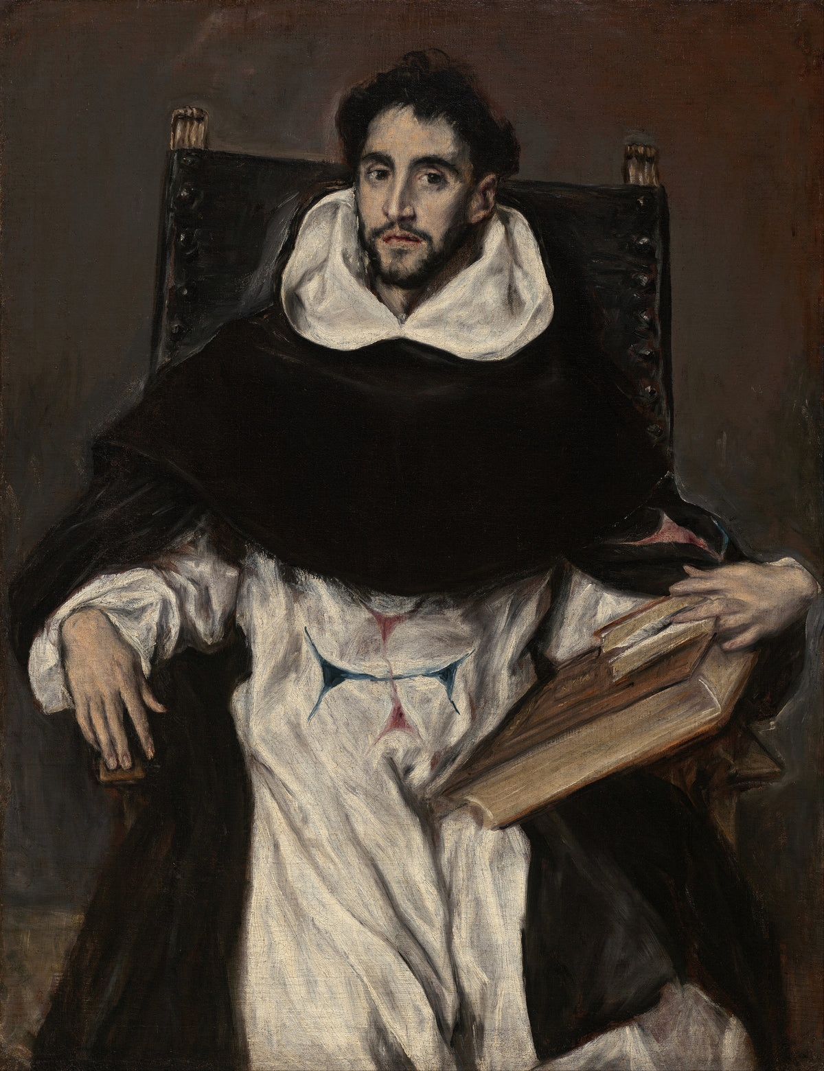 Fray Hortensio Félix Paravicino by El Greco — A friar in black and white seated in a studded chair