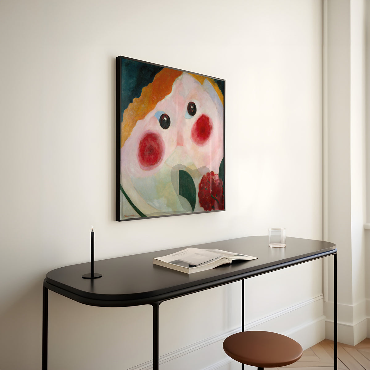 Framed art print of Girl with Buttercups by Theo van Doesburg, above a slim black console table