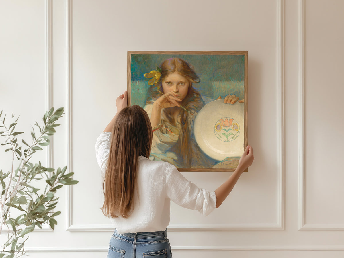 Framed art print of Girl with a Plate with a Folk Motif by Alphonse Mucha, hung on a panelled wall