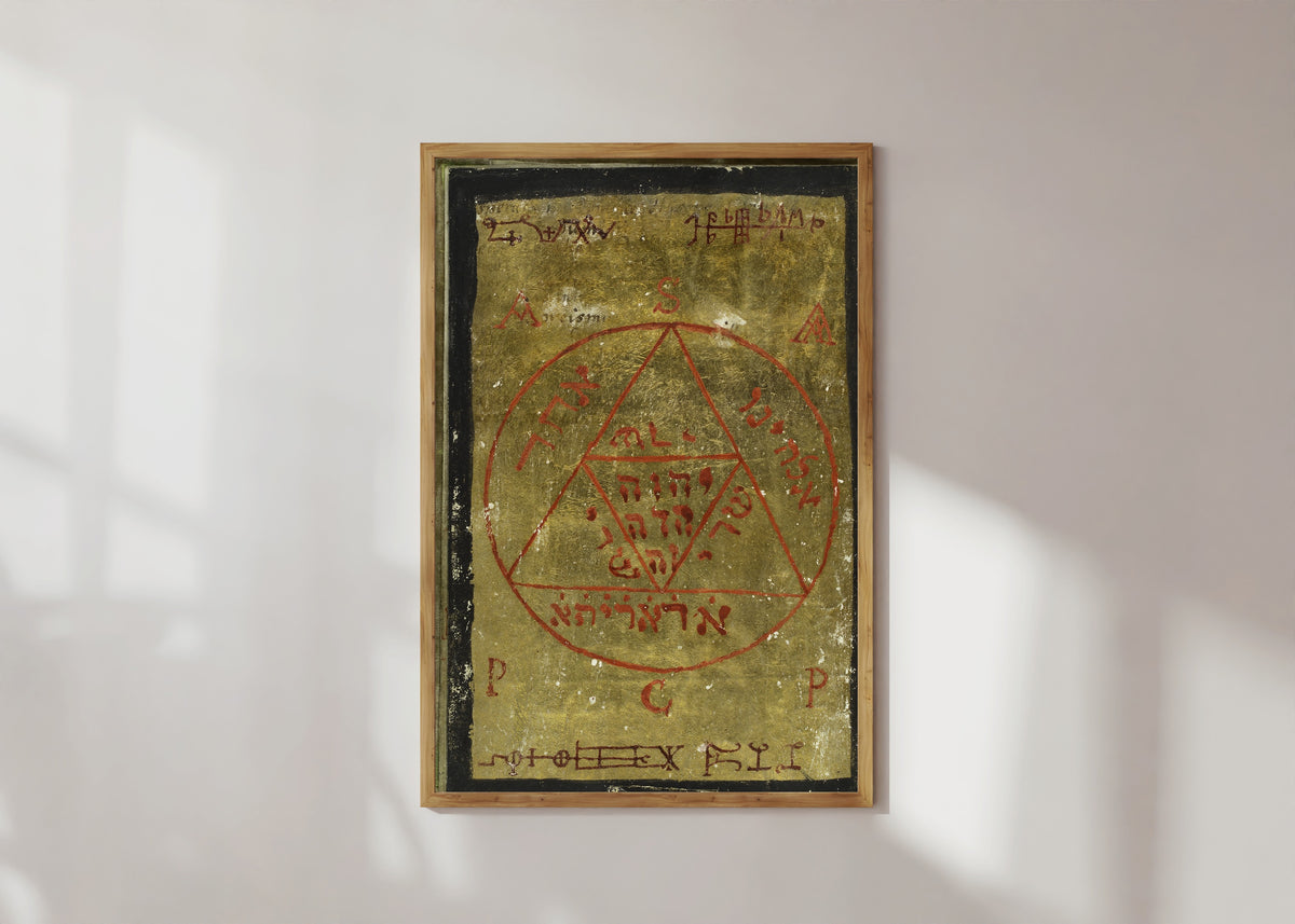 Framed art print of Gold Seal, from Cyprianus by Unknown artist, in a light wood frame on a sunlit white wall