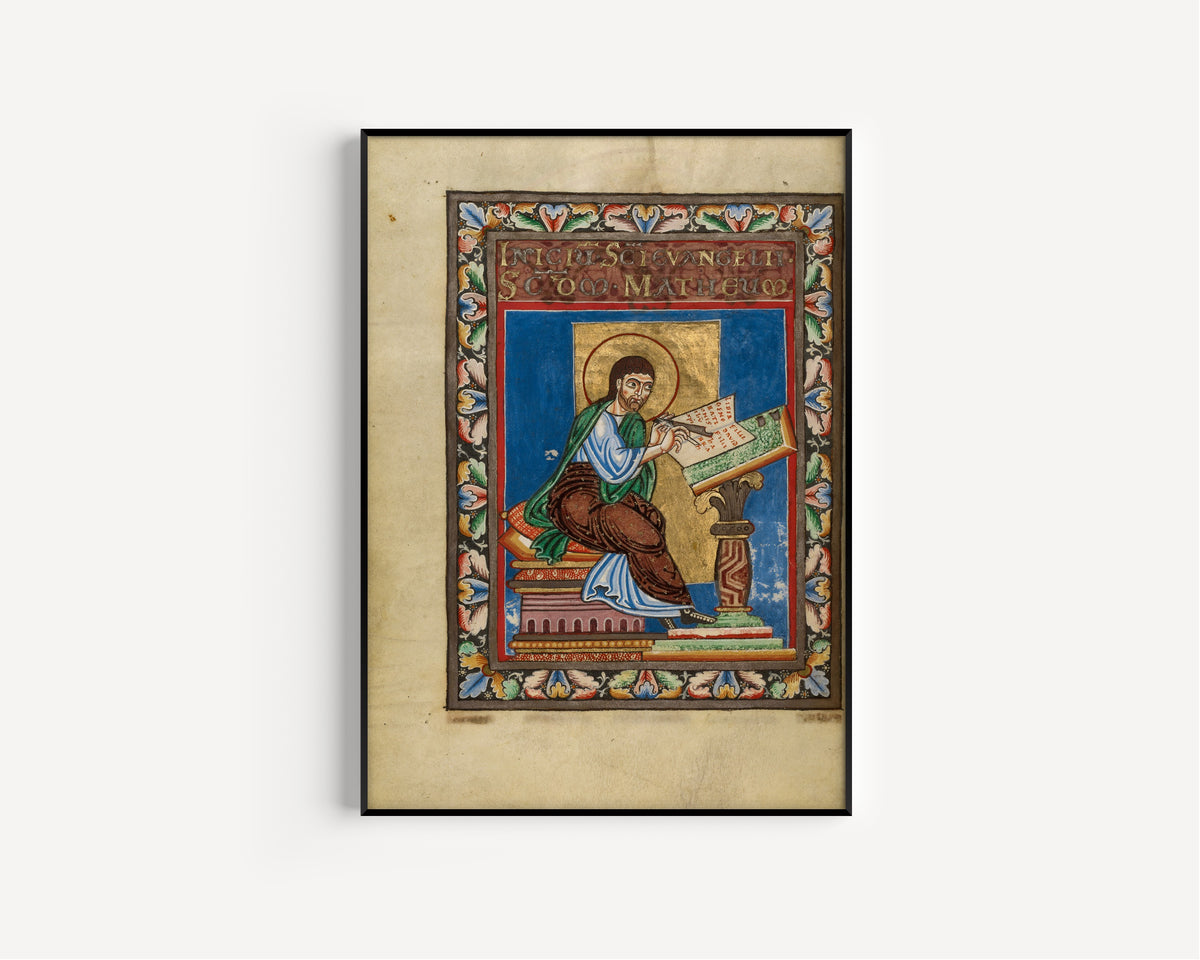Framed art print of Gospel Book: Saint Matthew, in a slim black frame on a plain white wall