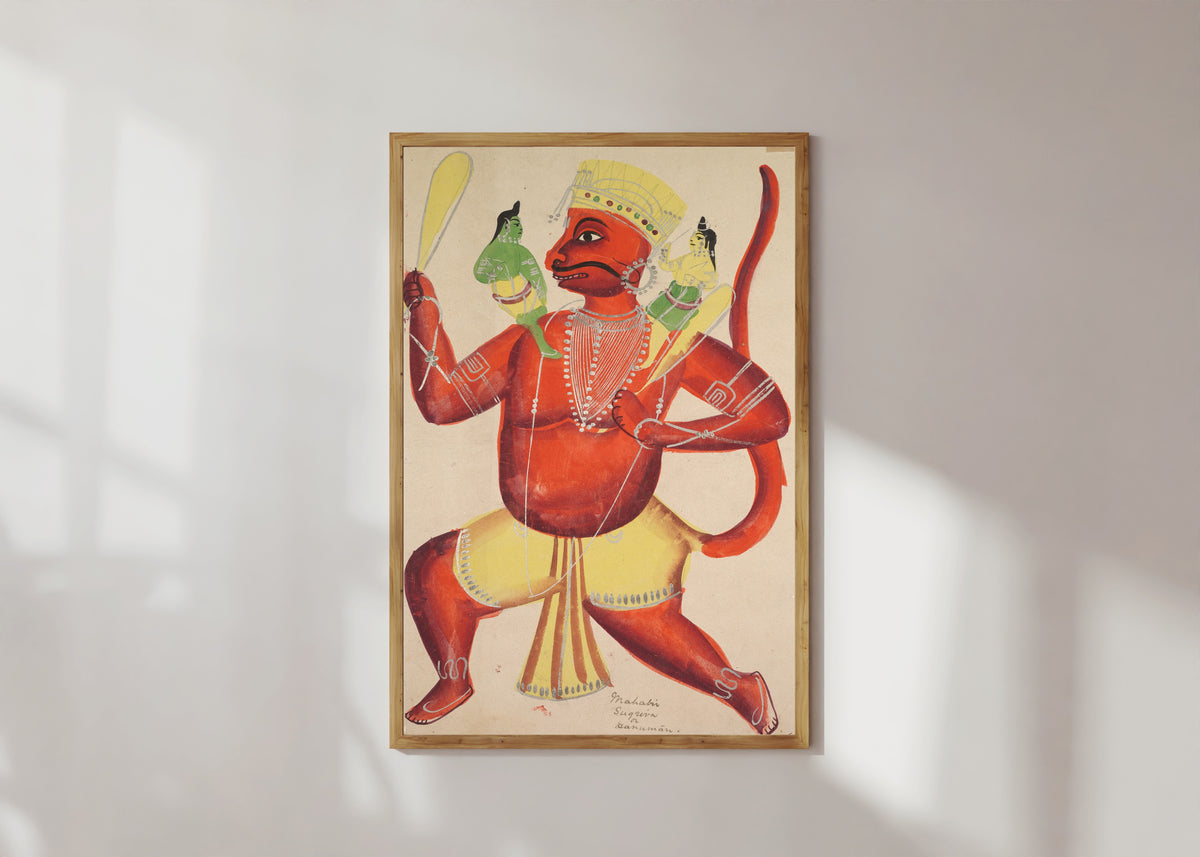 Framed art print of Hanuman with Rama and Lakshmana on his shoulders, from a Kalighat album by Kalighat painter, in a light wood frame on a sunlit white wall