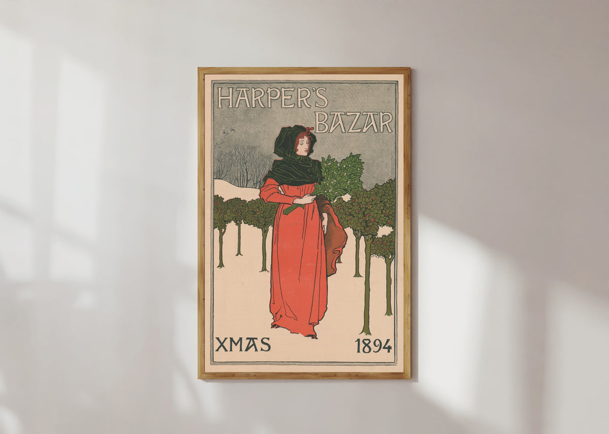 Framed art print of Harper's Bazar, Xmas 1894 by Louis Rhead, in a light wood frame on a sunlit white wall