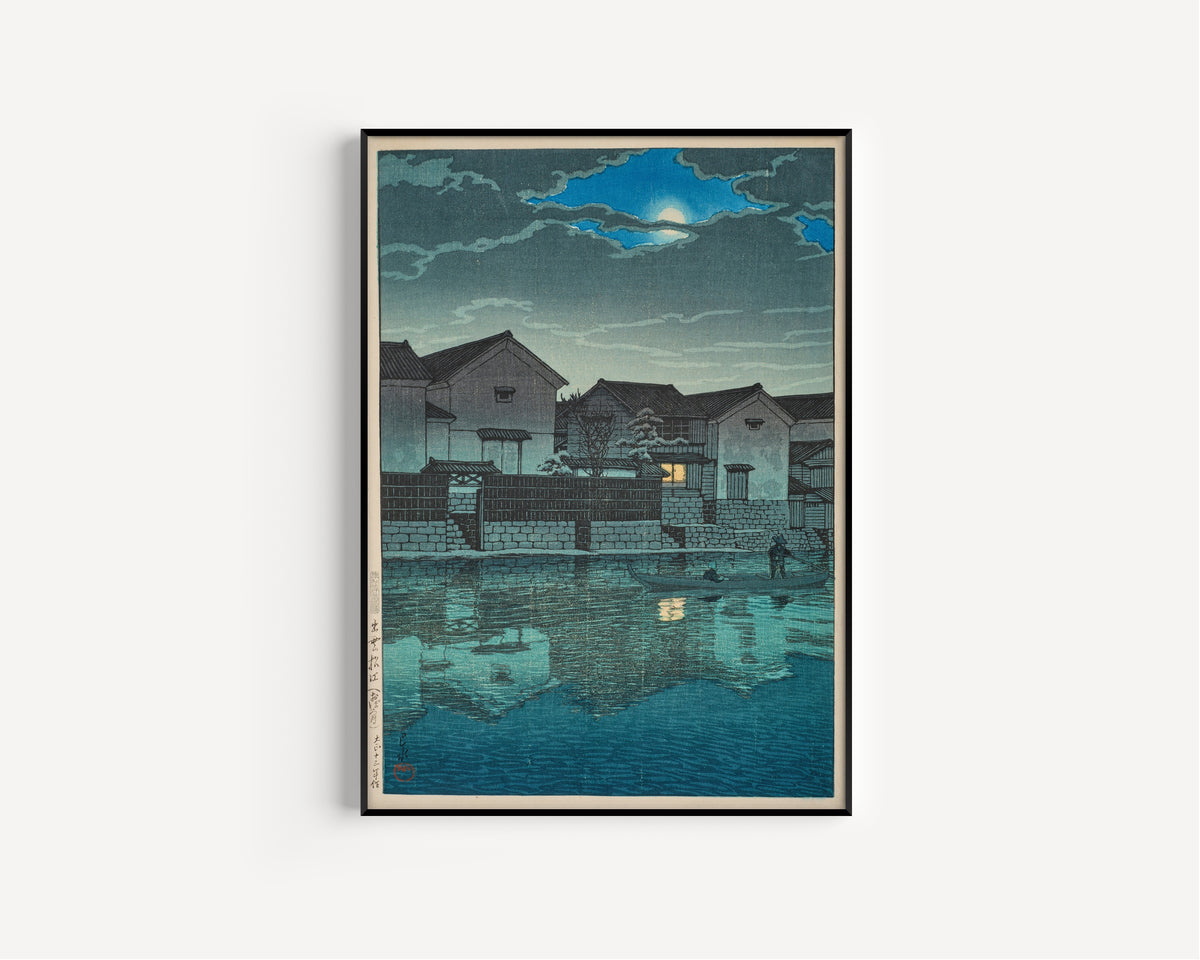 Framed art print of Hazy Moon at Matsue in Izumo by Kawase Hasui, in a slim black frame on a plain white wall