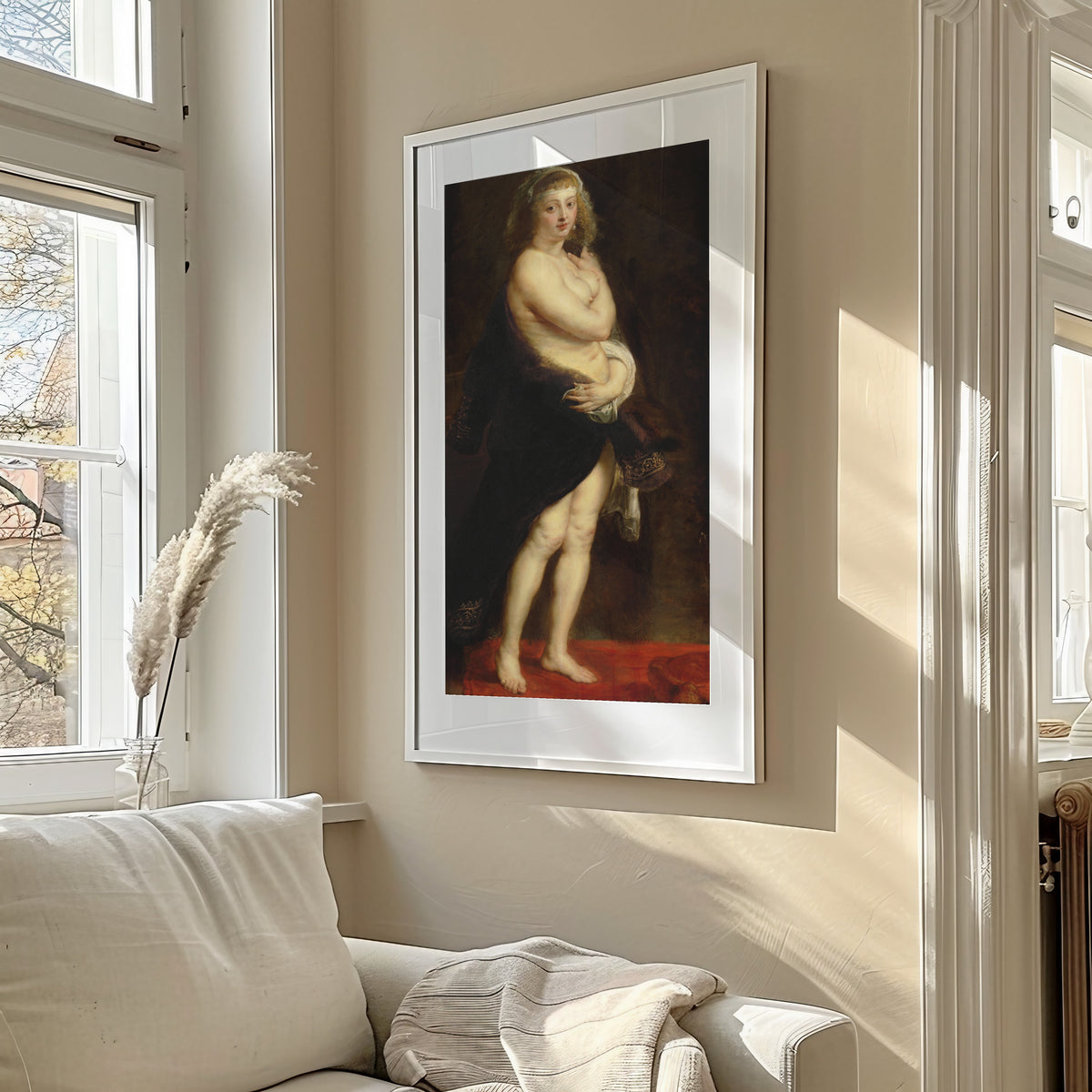 Framed art print of Helena Fourment in a Fur Robe by Peter Paul Rubens, in a sunlit living room above a sofa