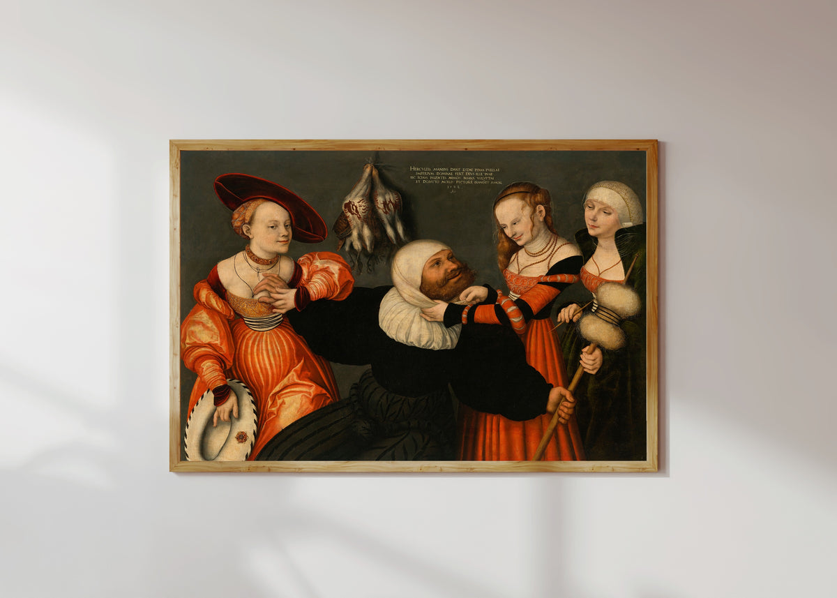 Framed art print of Hercules and Omphale by Lucas Cranach the Elder, in a light wood frame on a sunlit white wall