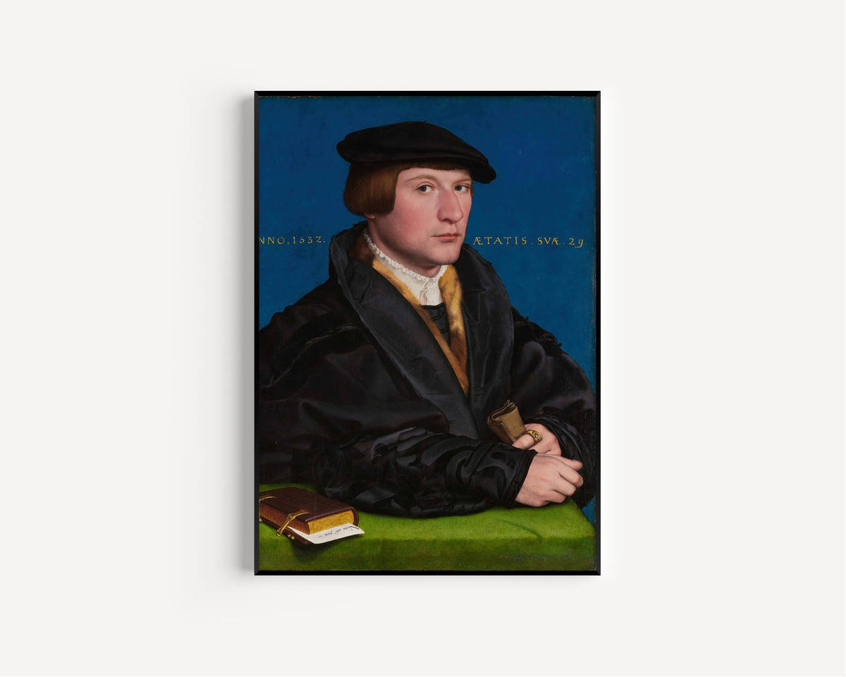 Framed art print of Hermann von Wedigh III by Hans Holbein the Younger, in a slim black frame on a plain white wall