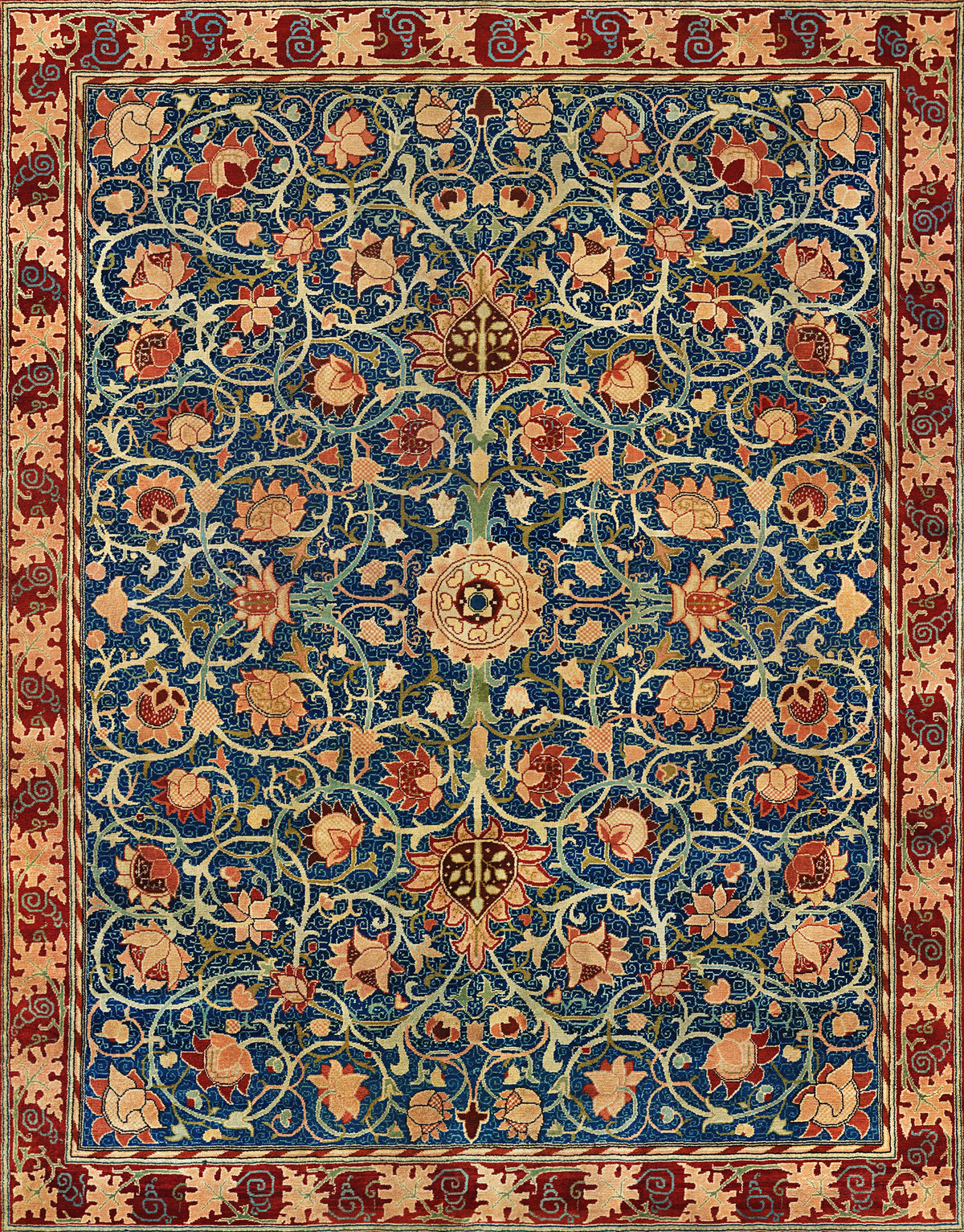 Holland Park Carpet by William Morris — Scrolling stems and blooms on a navy field with a crimson border