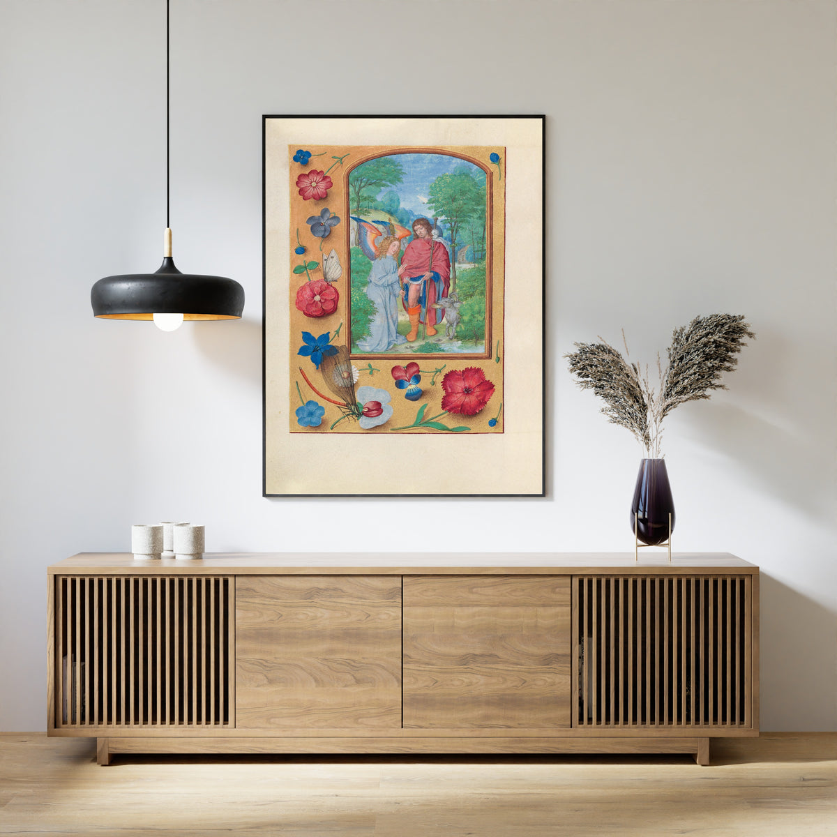 Framed art print of Hours of Queen Isabella the Catholic: Saint Roch by Master of the First Prayerbook of Maximilian, above a slatted wood sideboard