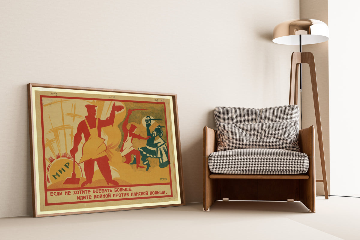 Framed art print of If You Don't Want to Fight Any More, Go to War Against… by Ivan Malyutin, leaning against a wall beside an armchair and a floor lamp