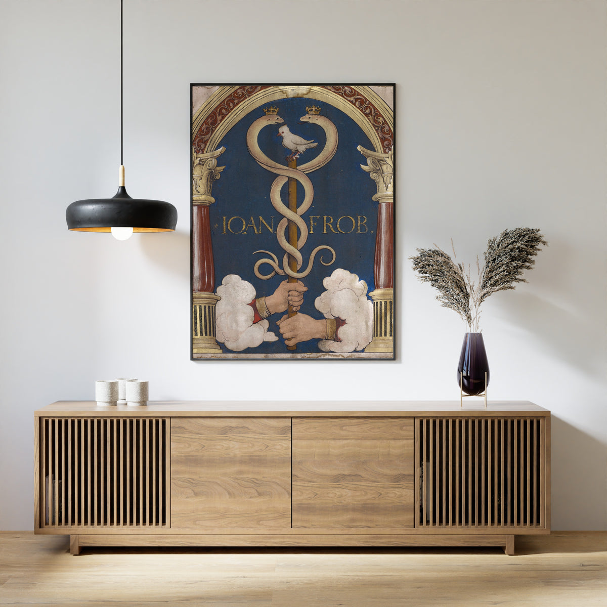 Framed art print of Impresa of the Basel Book Printer Johann Froben by Hans Holbein the Younger, above a slatted wood sideboard