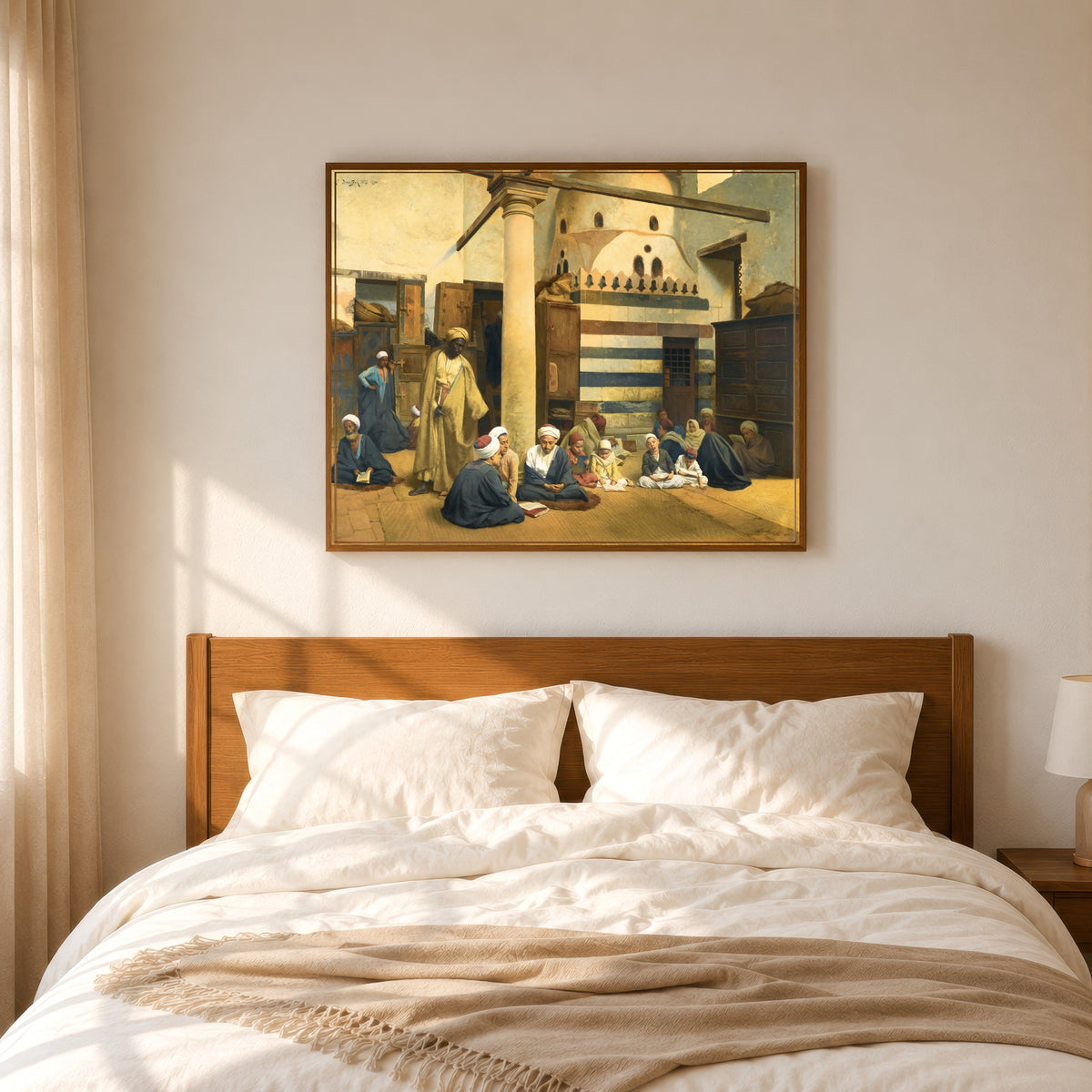 Framed art print of In the Madrasa by Ludwig Deutsch, in a slim wood frame above a bed in a sunlit bedroom