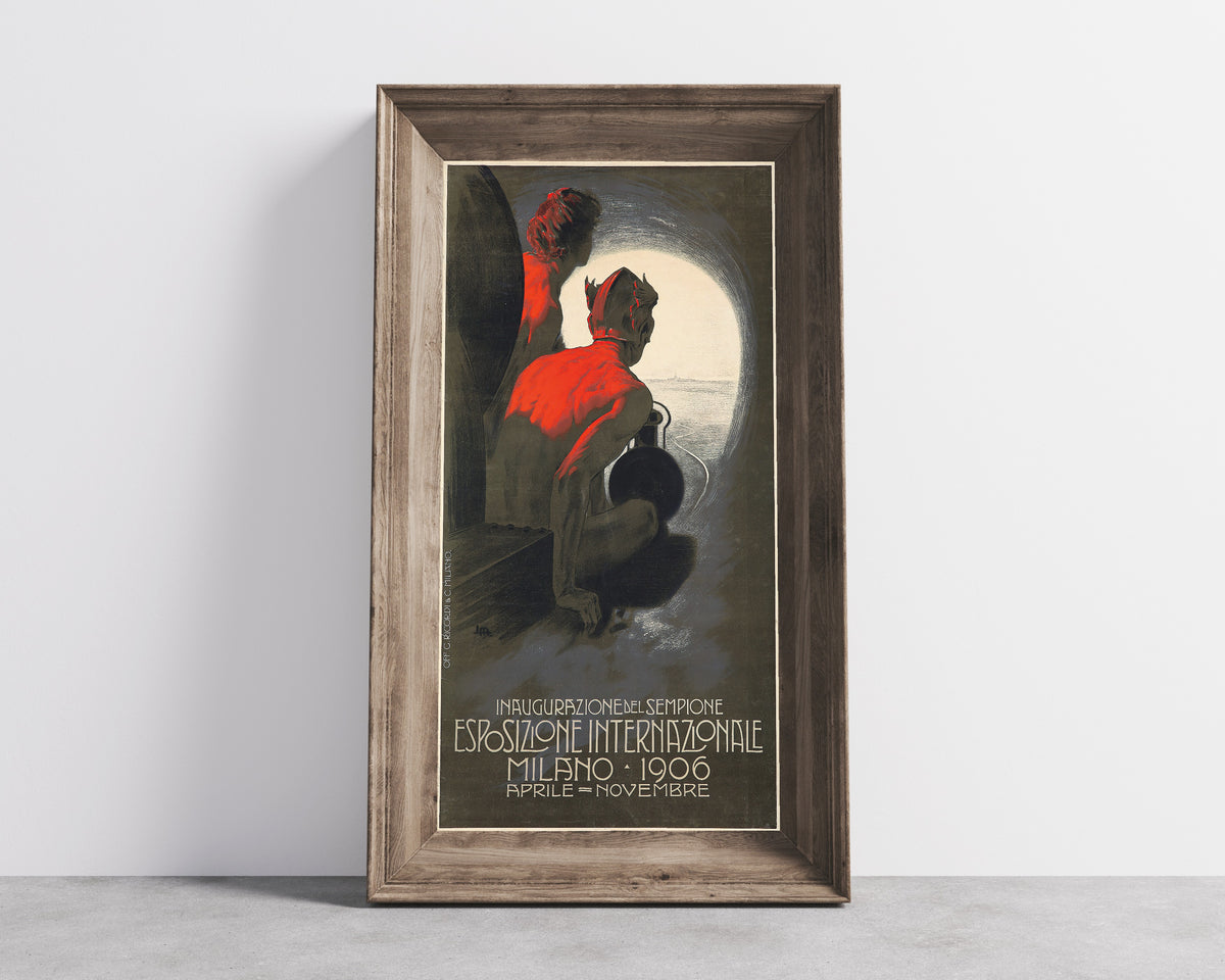 Framed art print of Inaugurazione del Sempione: Esposizione Internazionale… by Leopoldo Metlicovitz, in a wide wooden frame leaning against a concrete wall