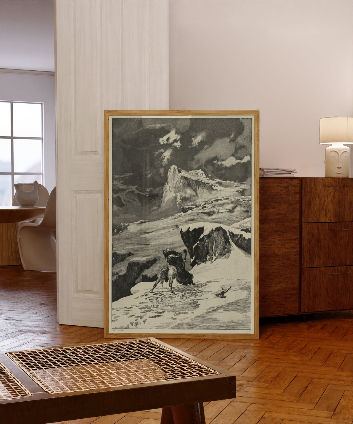Framed art print of Intermezzi: Battling Centaurs by Max Klinger, in a light wood frame leaning in a warm room with a parquet floor