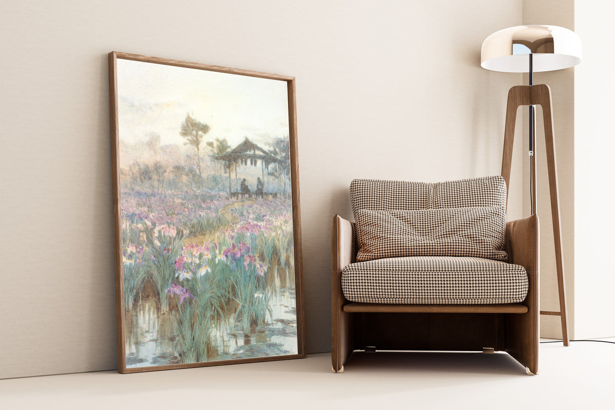 Framed art print of Iris Garden by Hiroshi Yoshida, leaning against a wall beside an armchair and a floor lamp