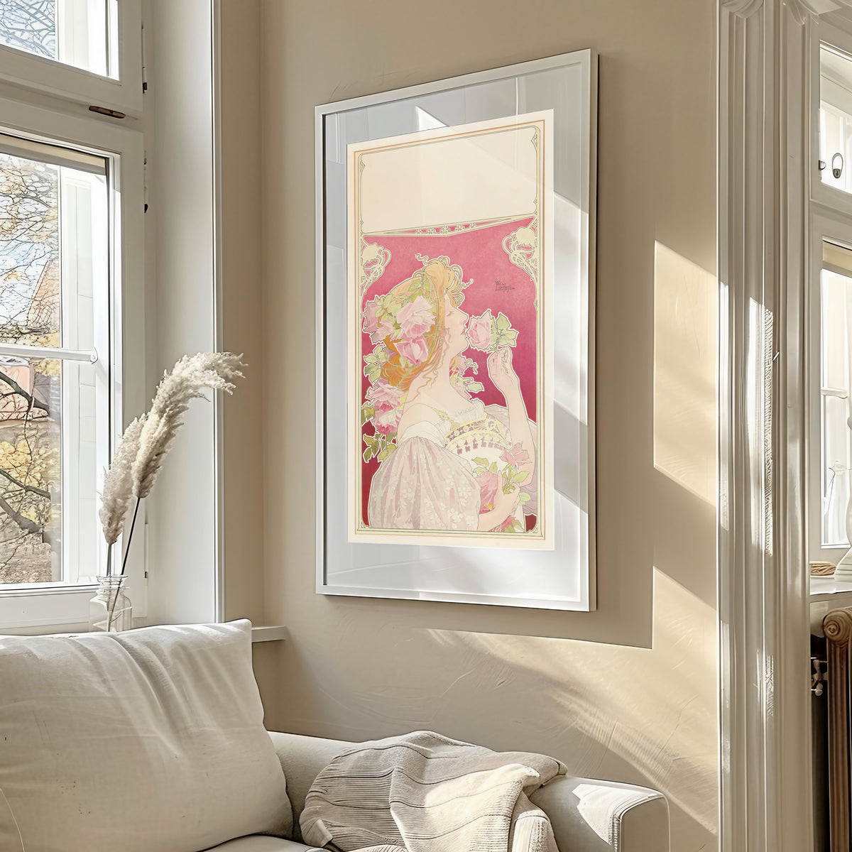 Framed art print of J.C. Boldoot Eau de Cologne (unlettered state) by Henri Privat-Livemont, in a sunlit living room above a sofa