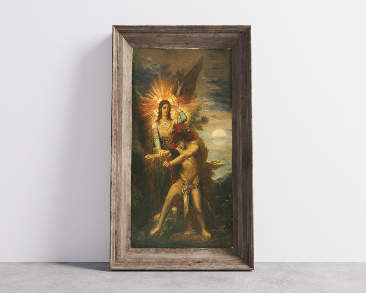 Framed art print of Jacob and the Angel by Gustave Moreau, in a wide wooden frame leaning against a concrete wall