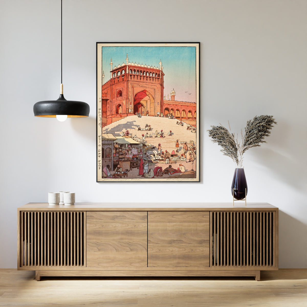 Framed art print of Jama Masjid, Delhi by Hiroshi Yoshida, above a slatted wood sideboard