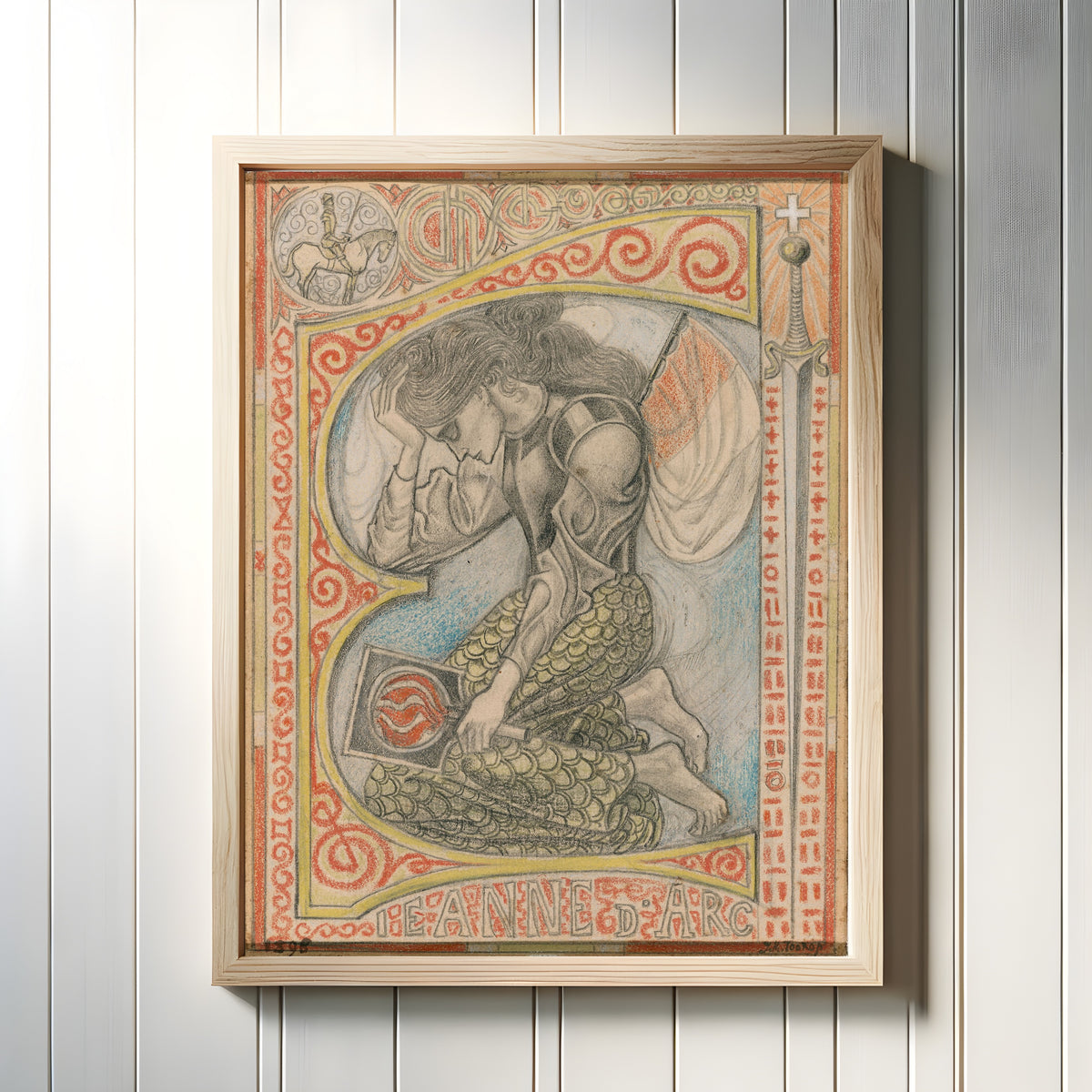 Framed art print of Joan of Arc by Jan Toorop, in a light wood frame on a white panelled wall