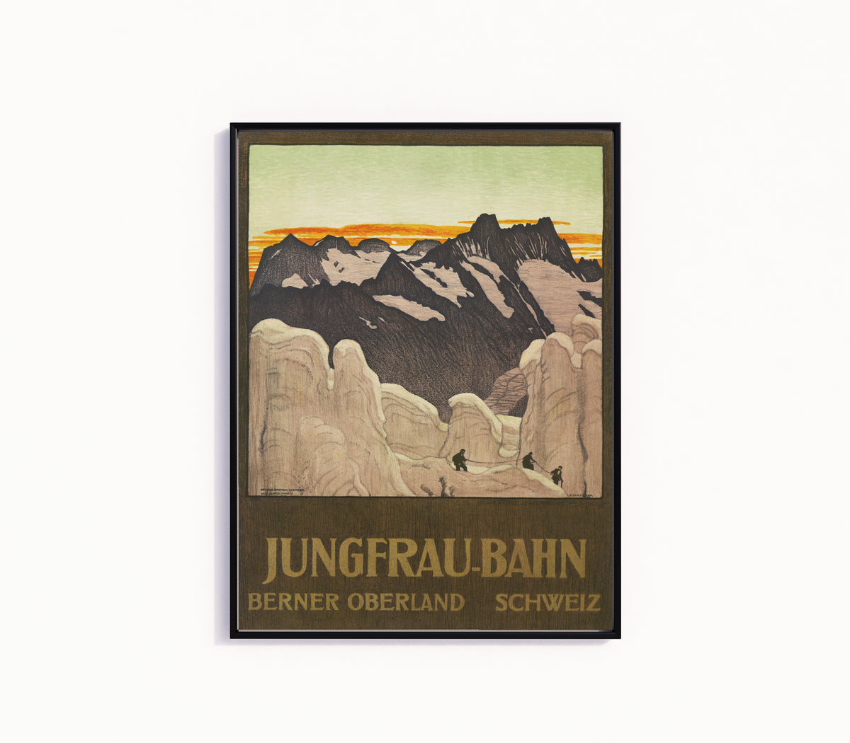 Framed art print of Jungfrau-Bahn: Berner Oberland, Schweiz by Emil Cardinaux, in a slim black frame on a plain white wall