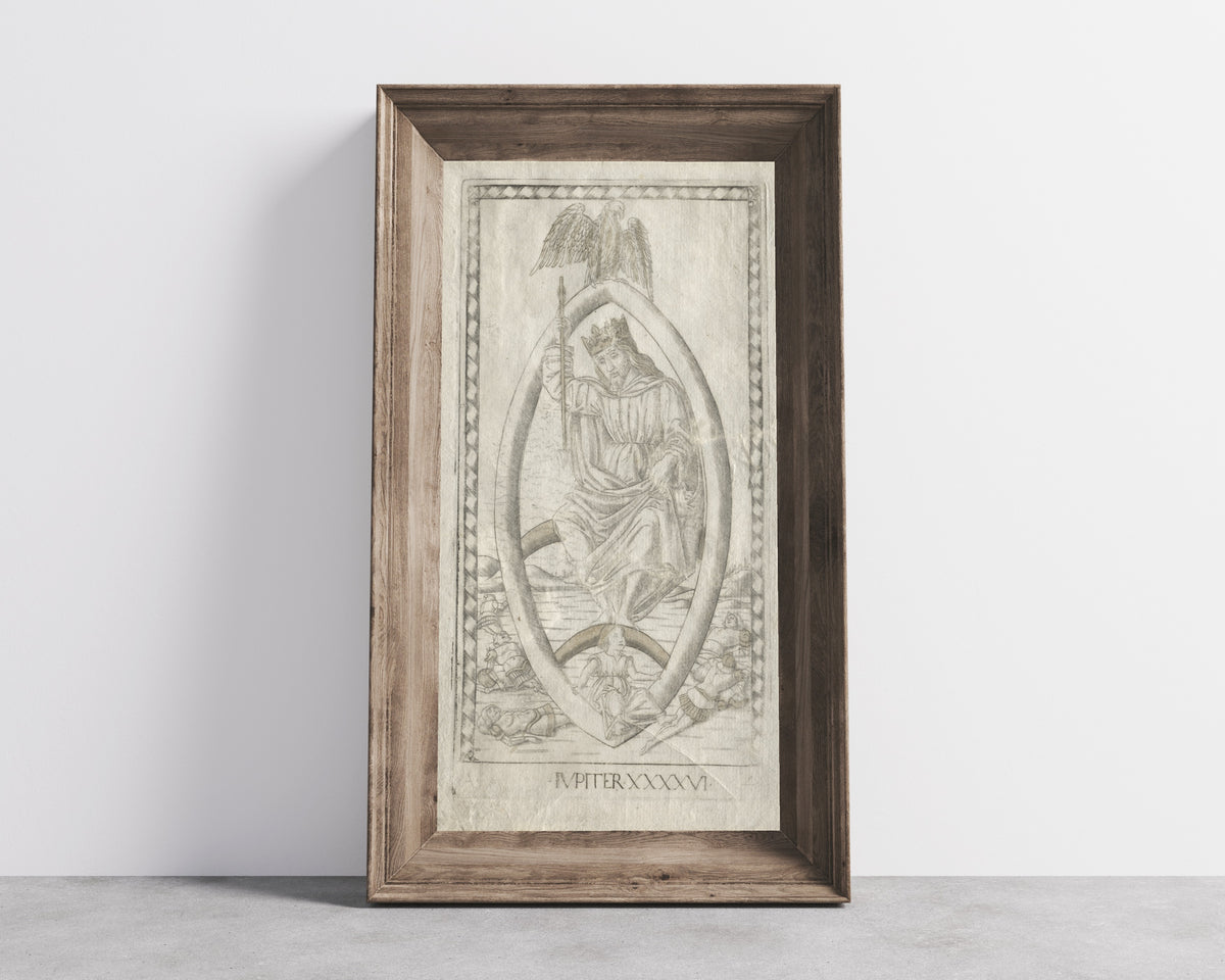 Framed art print of Jupiter (from the Tarocchi, Series A… by Master of the E-Series Tarocchi, in a wide wooden frame leaning against a concrete wall
