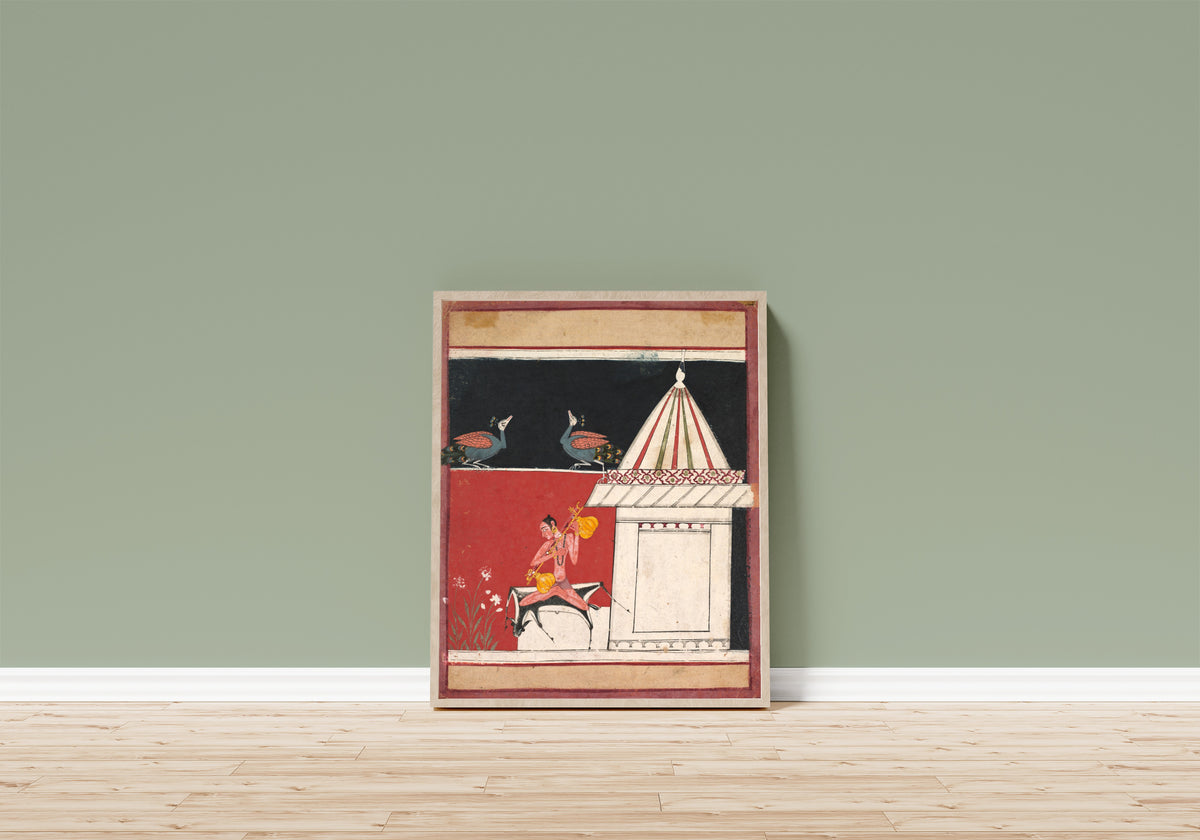 Framed art print of Kedara Ragini by Malwa school, in a light wood frame leaning on a sage green wall above a wooden floor