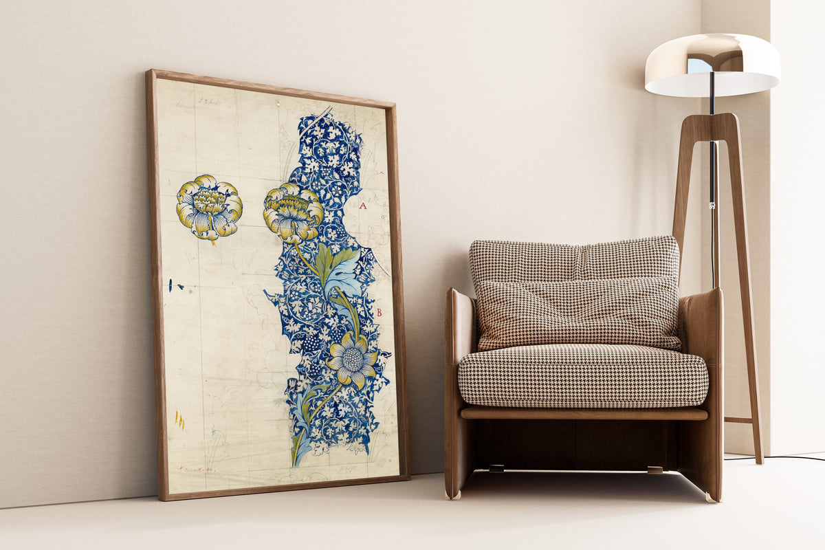 Framed art print of Kennet (Design Drawing) by William Morris, leaning against a wall beside an armchair and a floor lamp