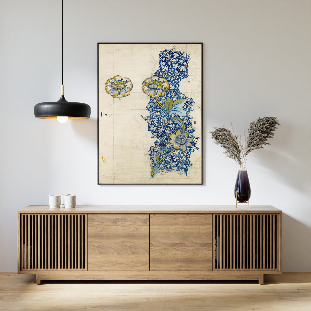 Framed art print of Kennet (Design Drawing) by William Morris, above a slatted wood sideboard