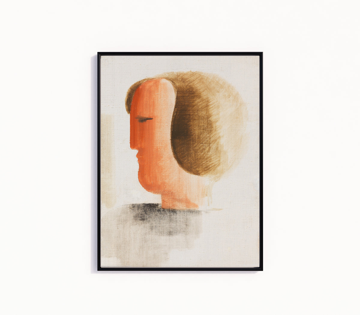 Framed art print of Kopf nach links by Oskar Schlemmer, in a slim black frame on a plain white wall