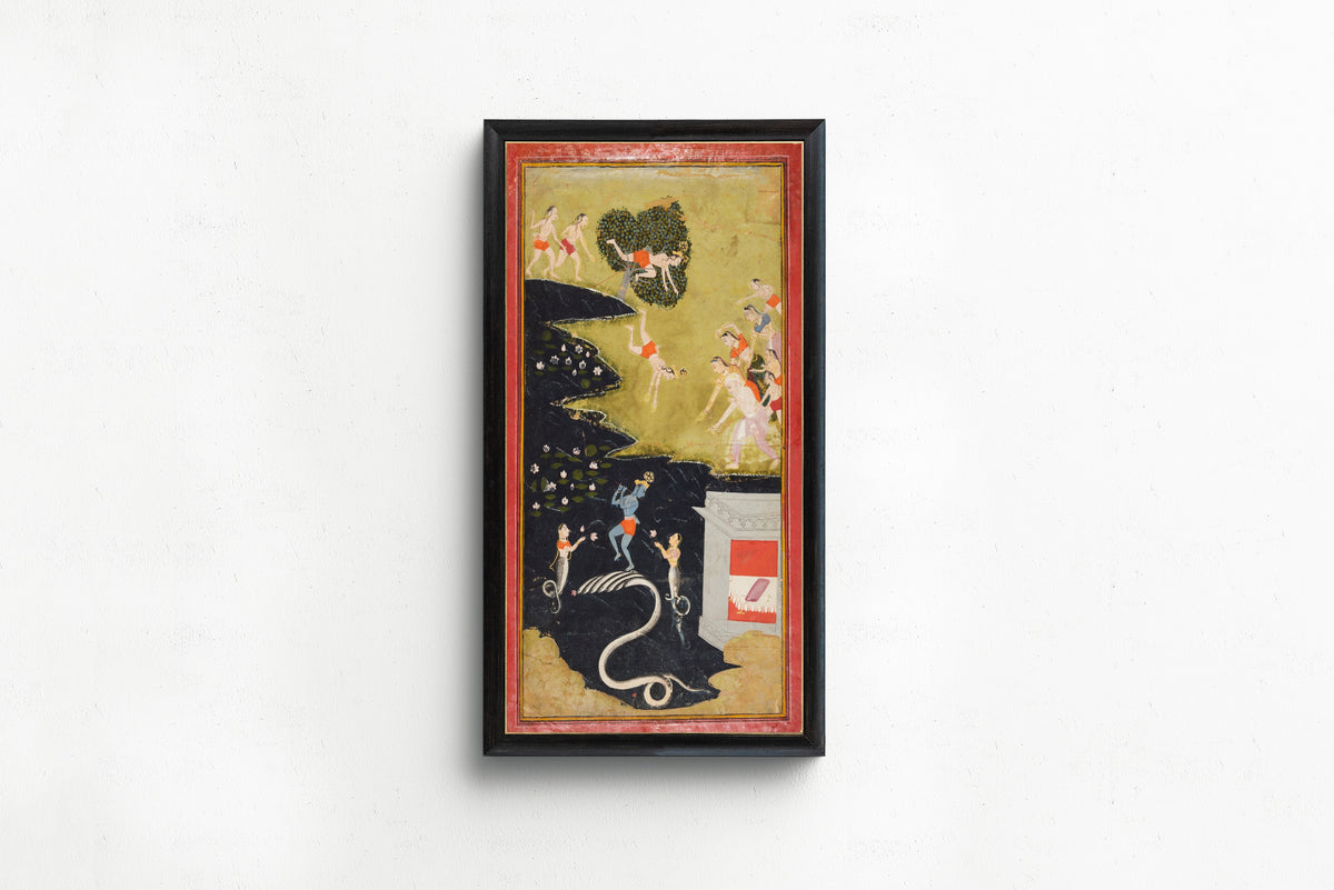 Framed art print of Krishna Quells the Serpent Kaliya by Mewar school, in a slim black frame on a plain white wall
