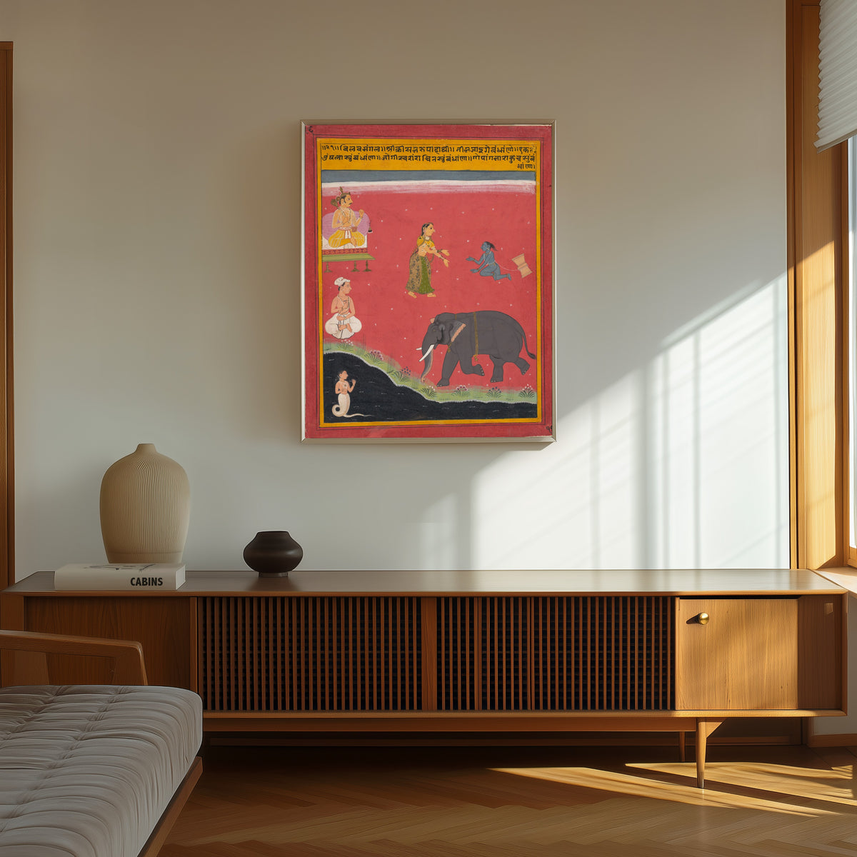 Framed art print of Krishna's Earthly Ties, Page from a Dispersed… by Mewar school, in a thin light frame on a sunlit wall above a wooden sideboard