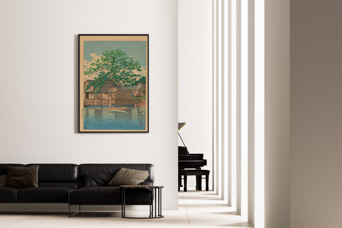 Framed art print of Kuri Ferry, Funabori by Kawase Hasui, on the wall of a minimal living room