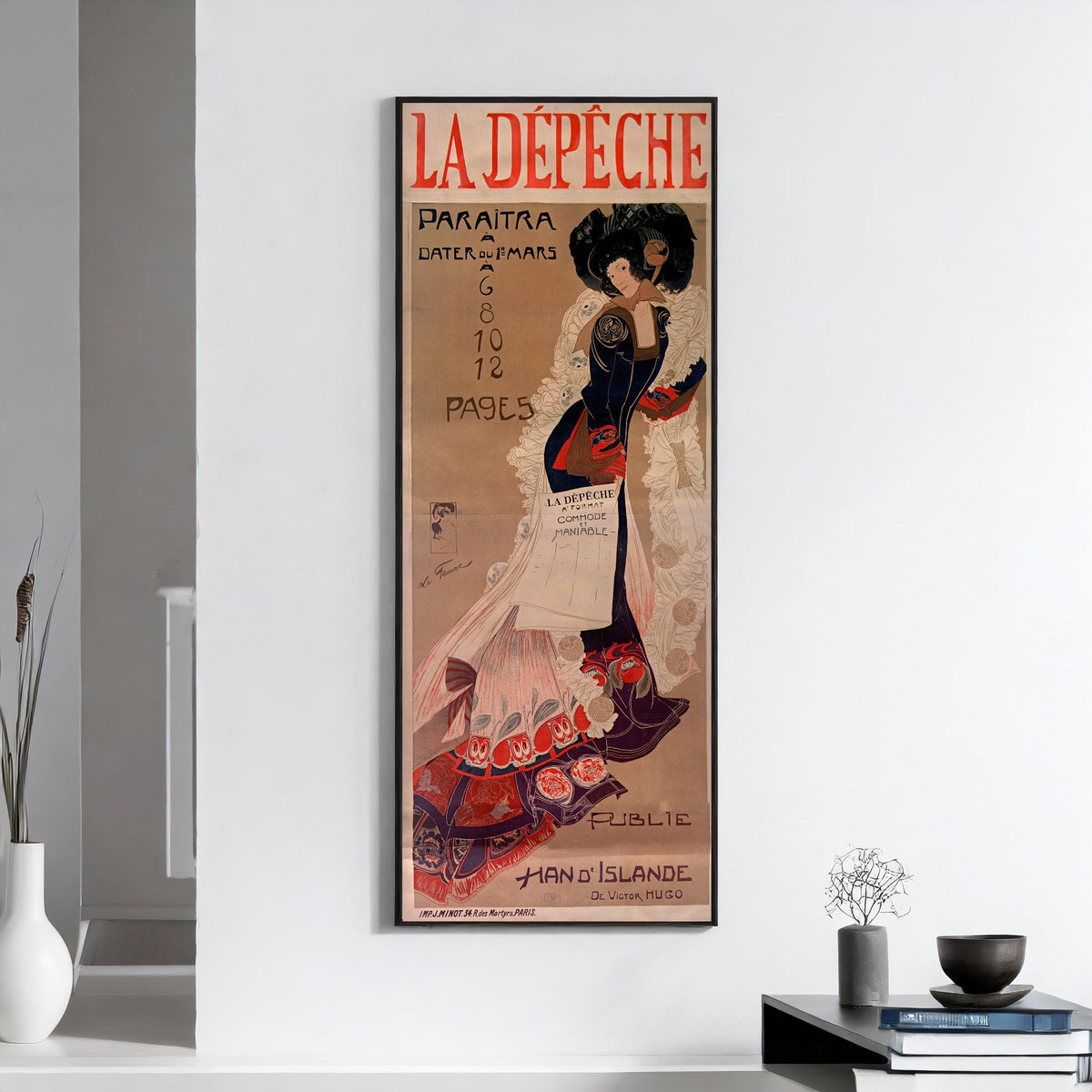 Framed art print of La Dépêche (Han d'Islande) by Georges de Feure, on a white wall above books and a bowl