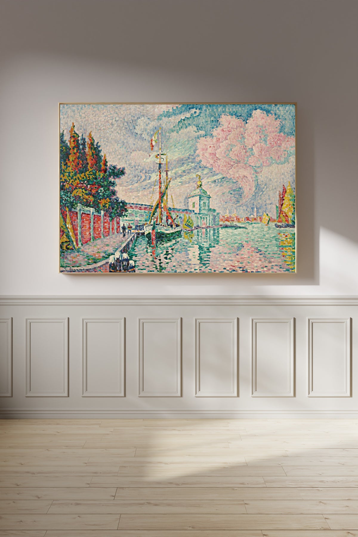 Framed art print of La Dogana, Venice by Paul Signac, on a panelled wall in afternoon light