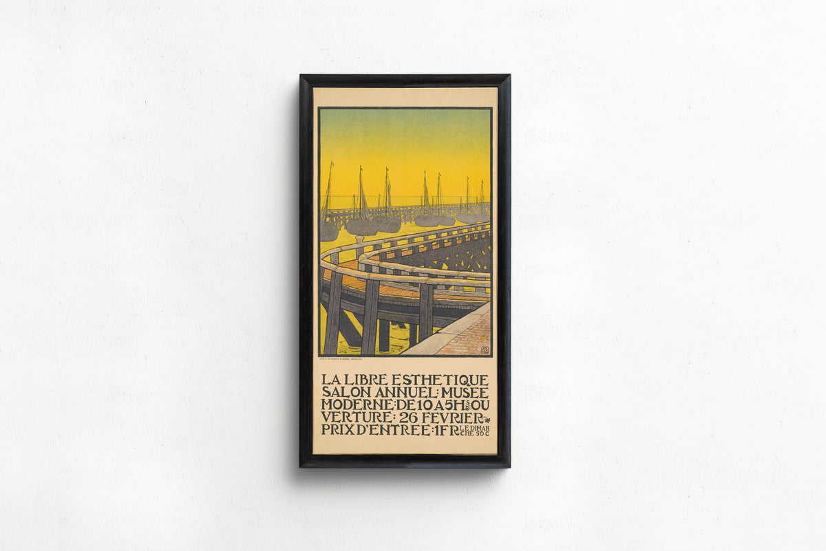 Framed art print of La Libre Esthétique, Salon Annuel (1903) by Gisbert Combaz, in a slim black frame on a plain white wall