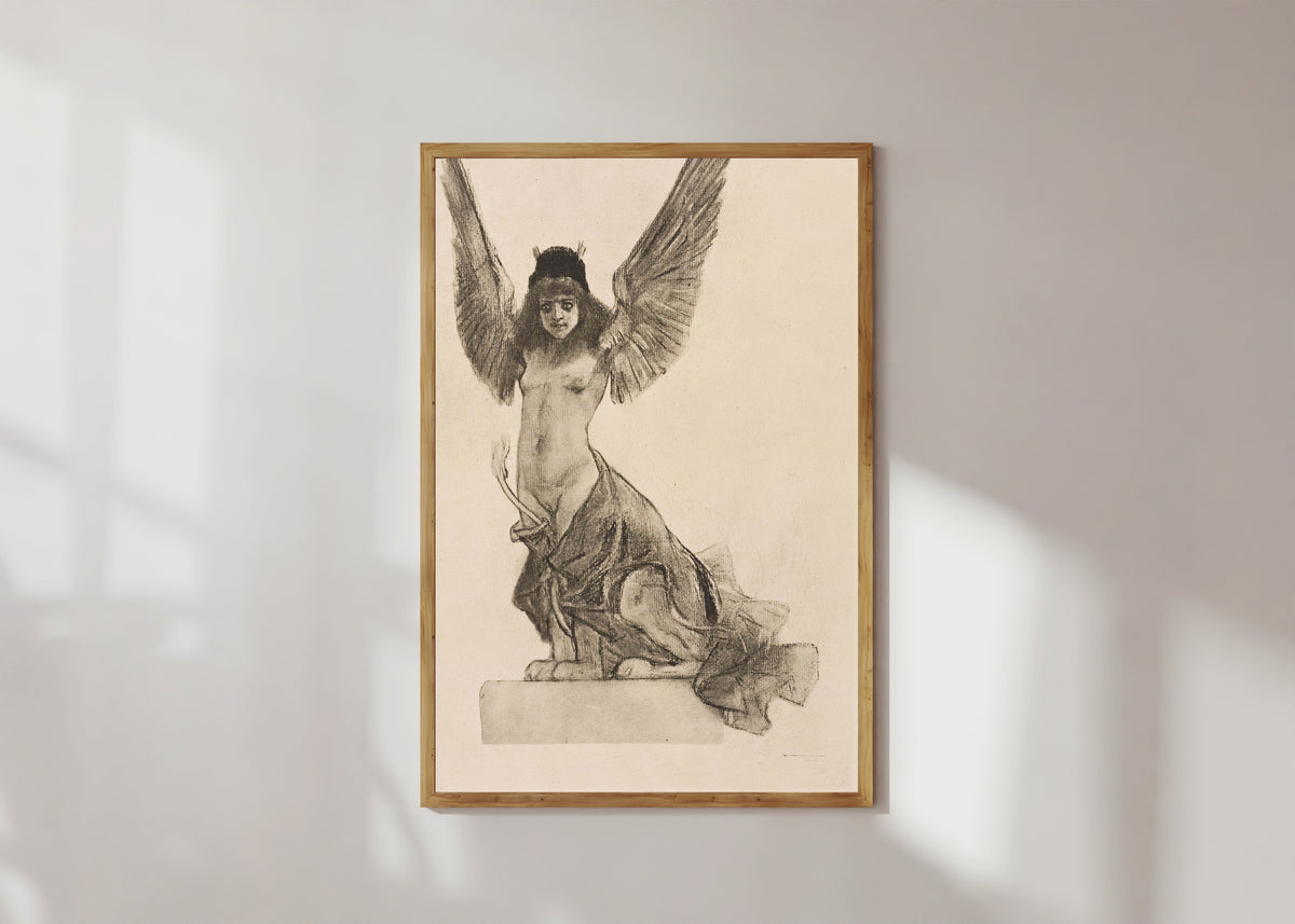 Framed art print of La sphynge ou Parallèlement by Félicien Rops, in a light wood frame on a sunlit white wall
