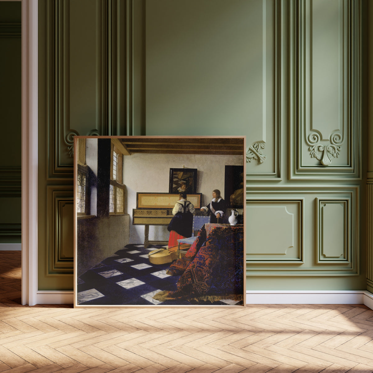 Framed art print of Lady at the Virginal with a Gentleman, ‘The Music Lesson’ by Johannes Vermeer, leaning against olive-green panelling on a herringbone floor