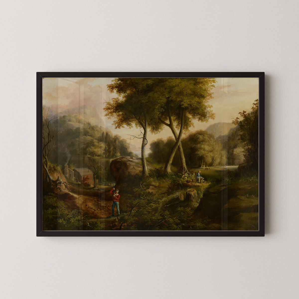 Landscape by Thomas Cole — in a black frame on a pale wall